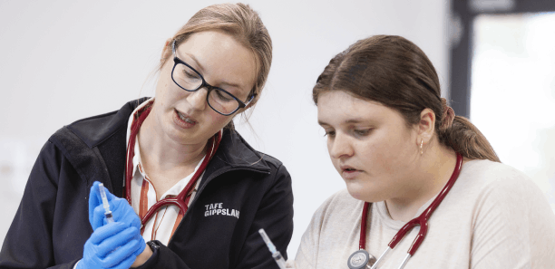 Teacher and students with syringes