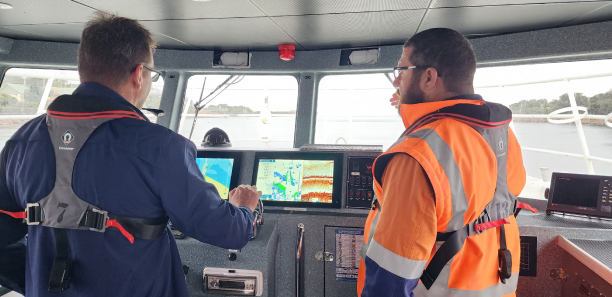 TAFE Gippsland trainer instructing a student in a boat