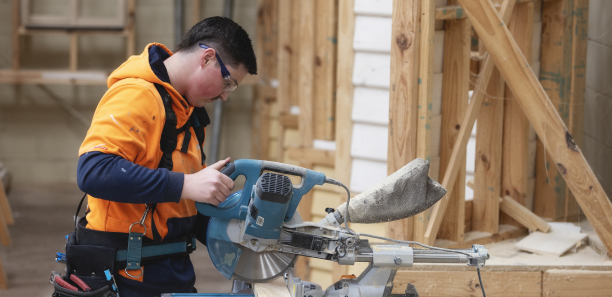 TAFE Gippsland carpentry student working with a power tool