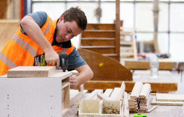 Young student working with tools