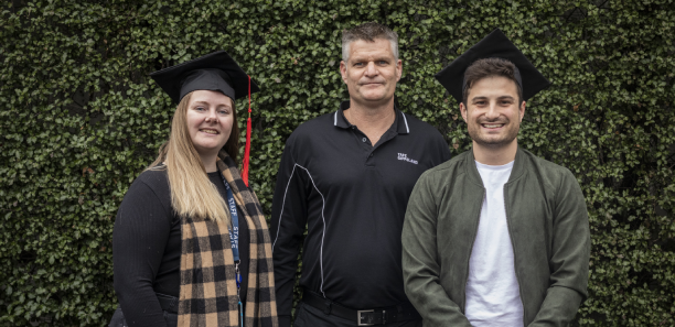 Trainer Luke Copland with students Irene Gabel and Jarod Dalzoto